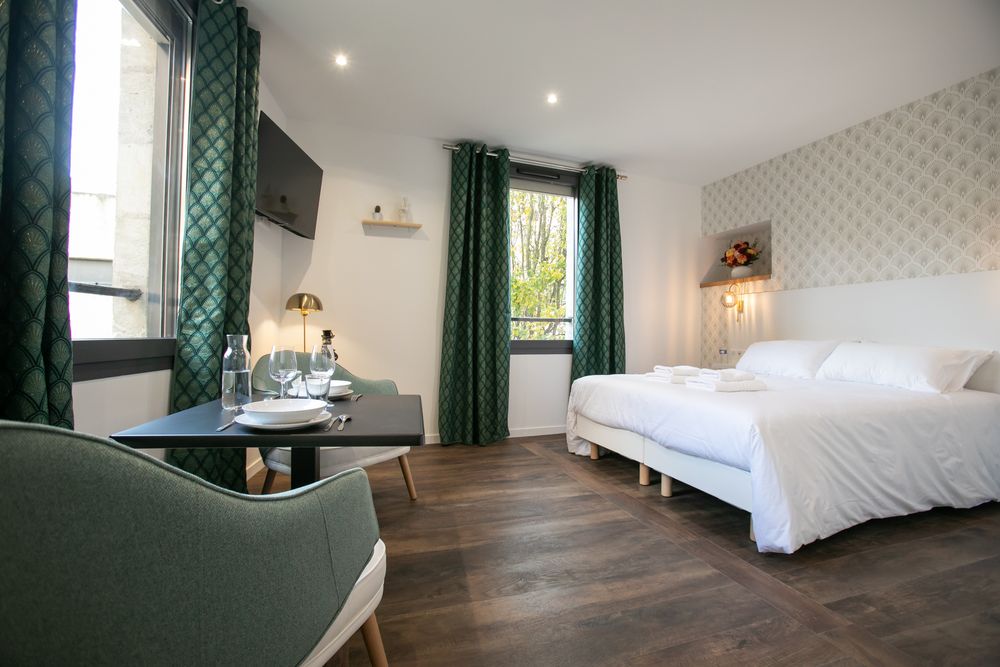 Chambre avec literie de type hôtelier
